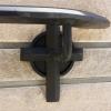 Close-up of mounting brackets on church handrail