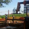 Setting epoxy anchored columns and base horizontals on concrete piers. This was the beginning of a project known as The Cloud House