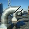 Rooftop square to round curbs and welded gore elbow exhaust duct