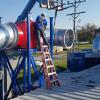 Installing 38" diameter welded pipe for a dust collection system.