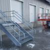 Heavy duty galvanized stairway with ADA railing and bar grate landing and treads