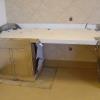 custom stainless steel cabinet/countertop with backsplash