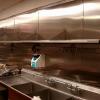 transformation by CHR Metals - awesome new stainless steel kitchen wall in a well known local restaurant 